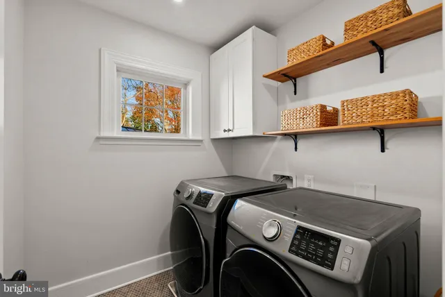 a bedroom with a bed and a tv