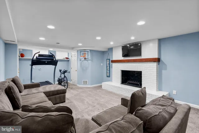 a view of a house with a big yard and potted plants