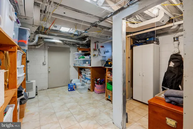 a front view of a house with sitting area