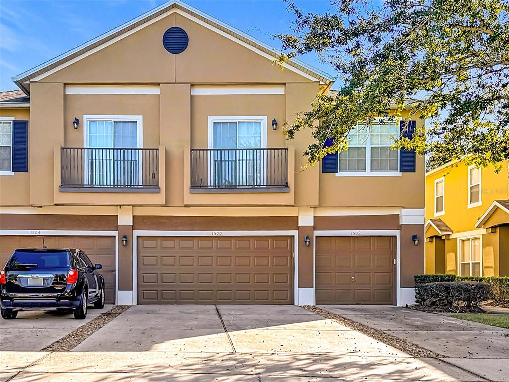 1500 Broken Oak Drive, Unit 25B Winter Garden, FL 34787 - Photo 1 of 62 a view of a car park in front of house