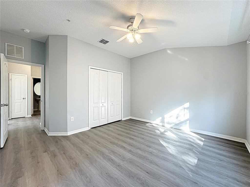 1500 Broken Oak Drive, Unit 25B Winter Garden, FL 34787 - Photo 47 of 62 a view of an empty room with wooden floor