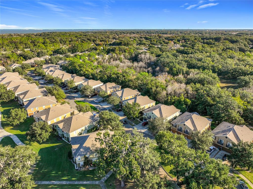 1500 Broken Oak Drive, Unit 25B Winter Garden, FL 34787 - Photo 5 of 62 an aerial view of residential houses with outdoor space and trees