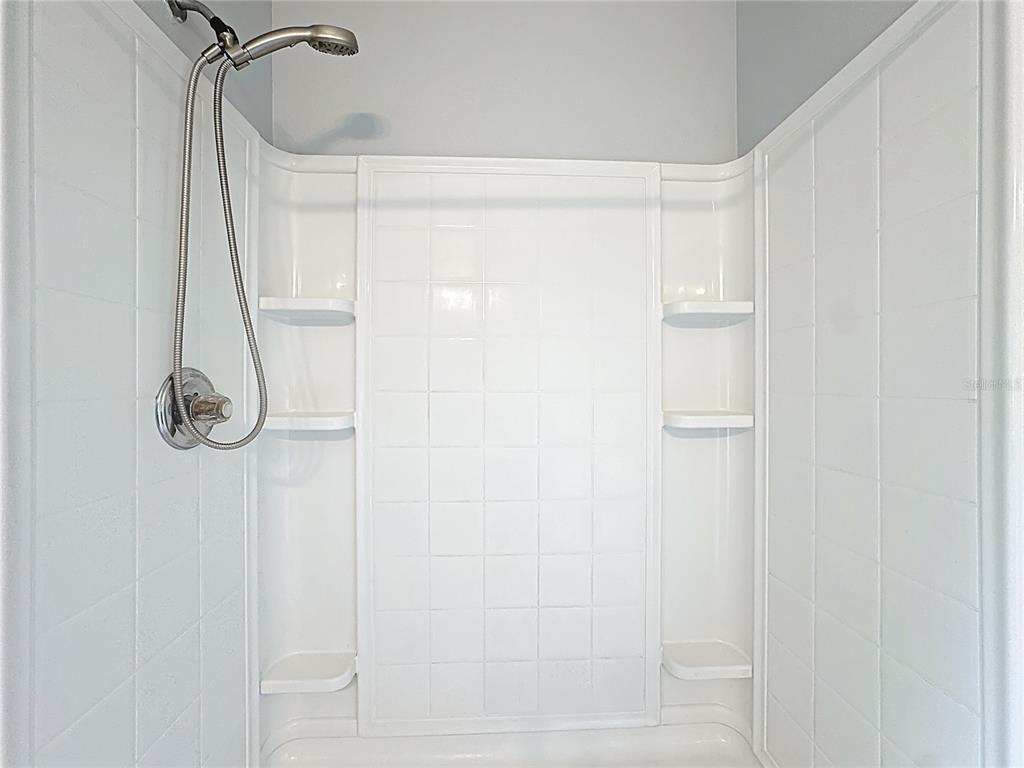 1500 Broken Oak Drive, Unit 25B Winter Garden, FL 34787 - Photo 51 of 62 a bathroom with a shower