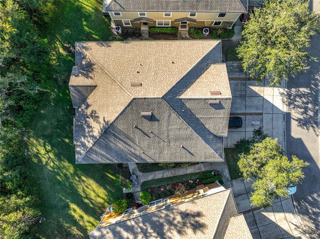 1500 Broken Oak Drive, Unit 25B Winter Garden, FL 34787 - Photo 59 of 62 a aerial view of a house with a yard