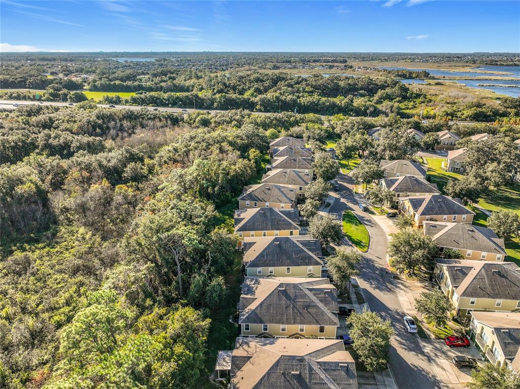 1500 Broken Oak Drive, Unit 25B Winter Garden, FL 34787 - Photo 61 of 62 an aerial view of residential houses with outdoor space