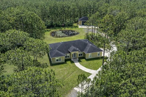 $699,999 | 859 Leather Fern Lane, Mims, FL 32754