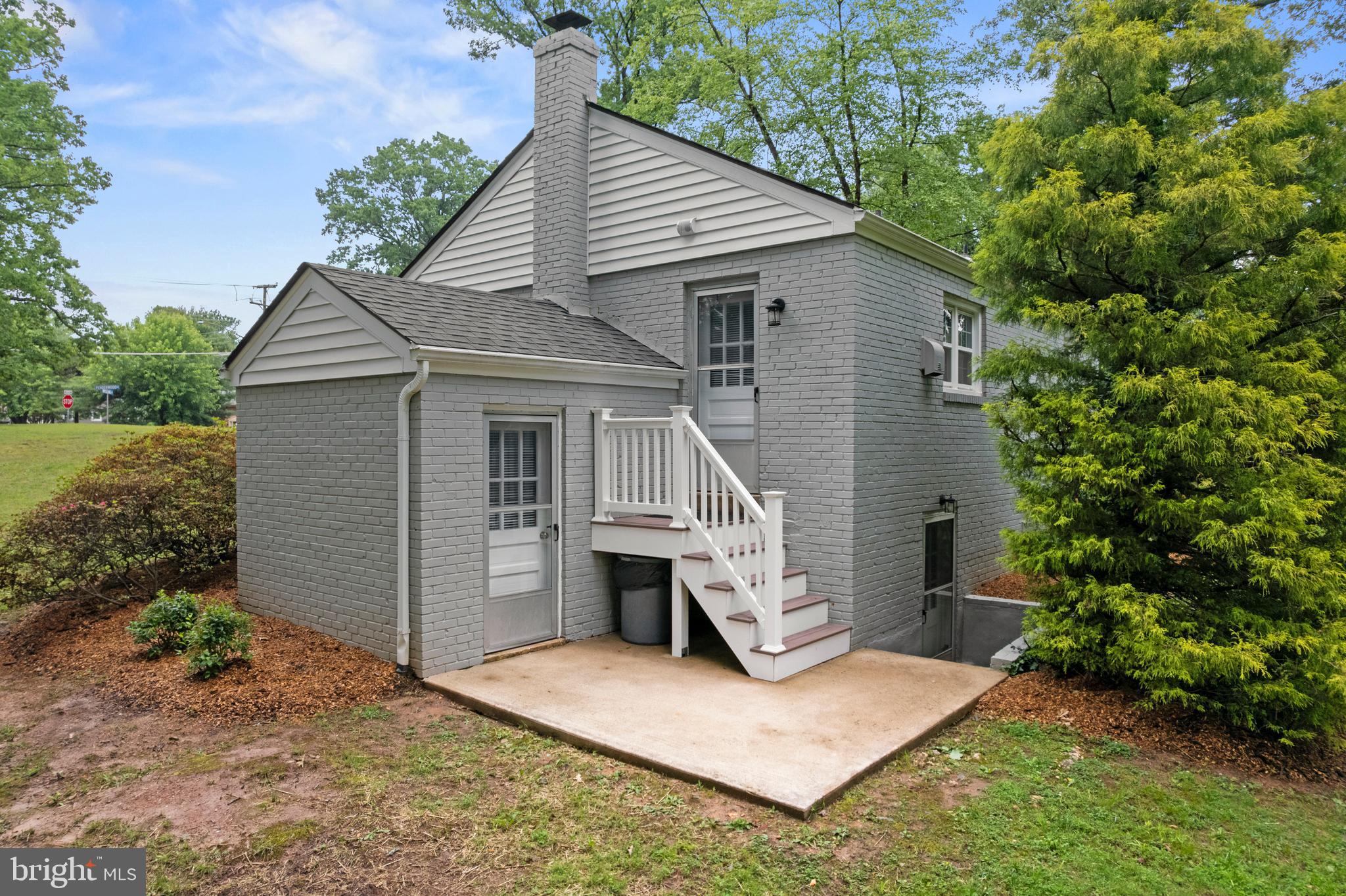 12131 Waples Mill Road Oakton, VA 22124 - Photo 29 of 40 front view of a house with a yard