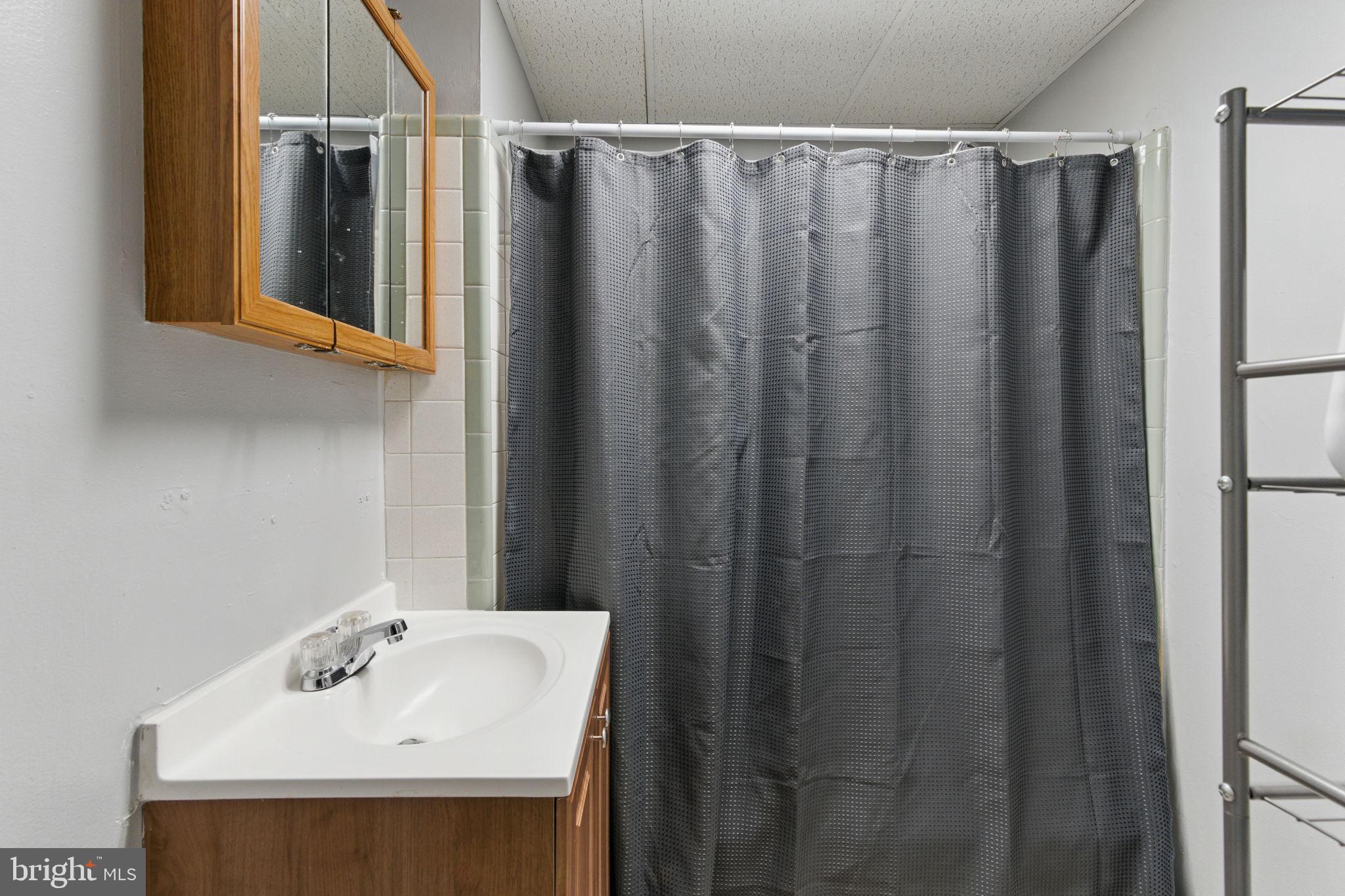 4508 Post Road Marcus Hook, PA 19061 - Photo 14 of 38 a bathroom with a sink and a mirror