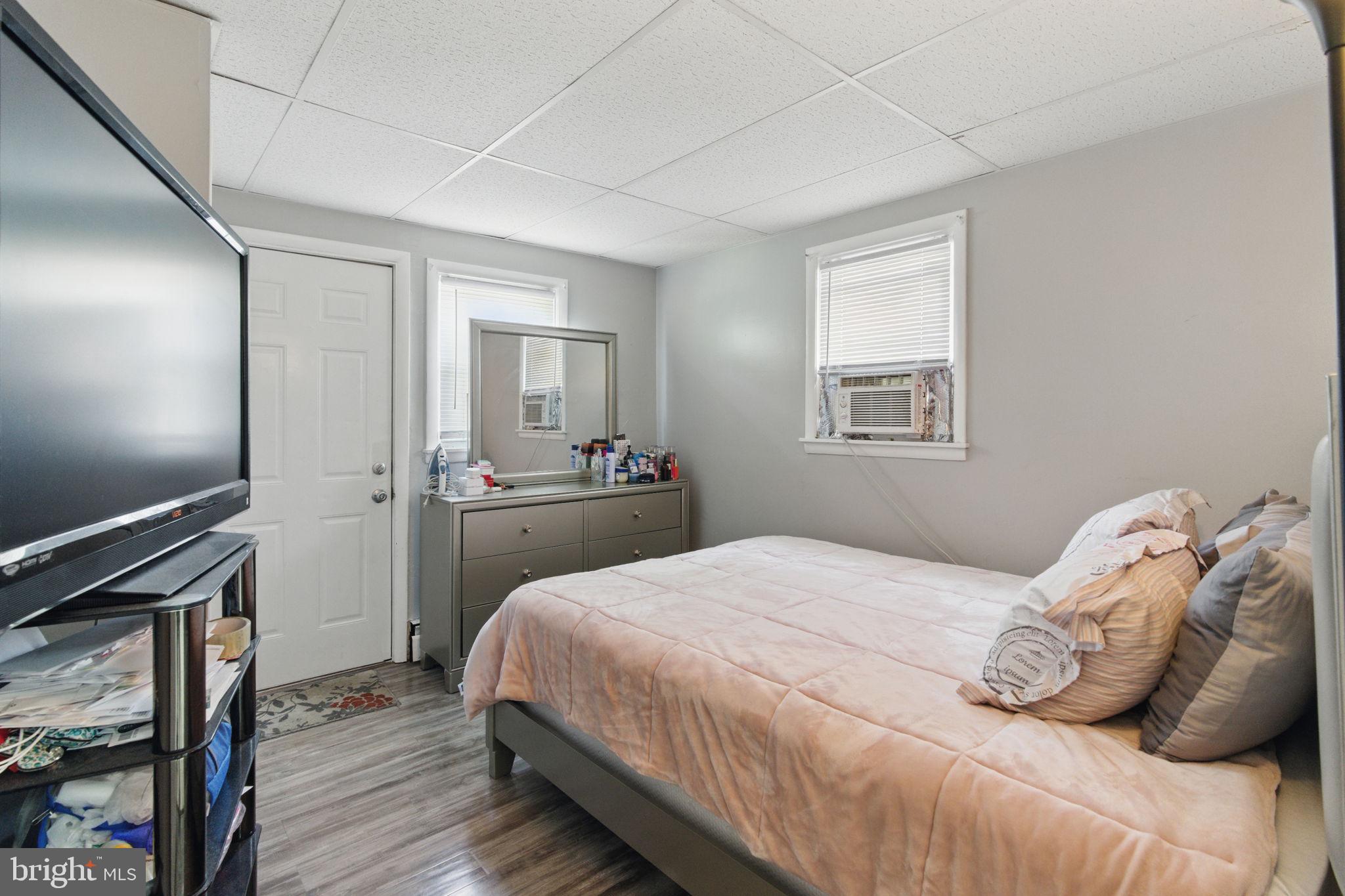 4508 Post Road Marcus Hook, PA 19061 - Photo 17 of 38 a bedroom with a bed and a tv