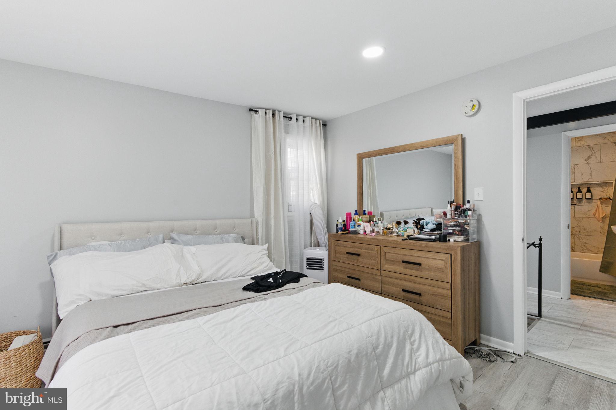 4508 Post Road Marcus Hook, PA 19061 - Photo 21 of 38 a bedroom with a bed and a dresser