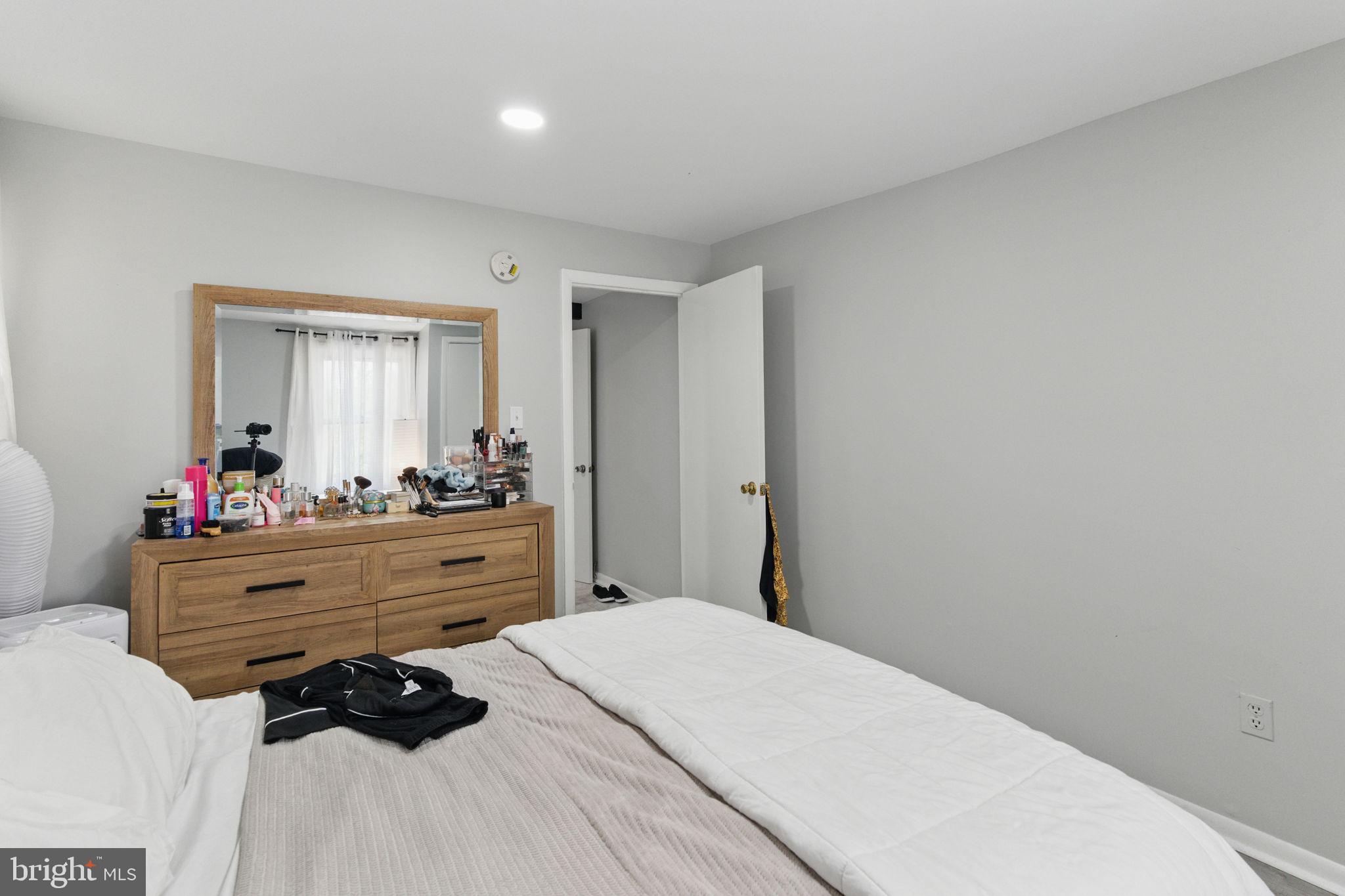 4508 Post Road Marcus Hook, PA 19061 - Photo 22 of 38 a room with a bed and a dresser