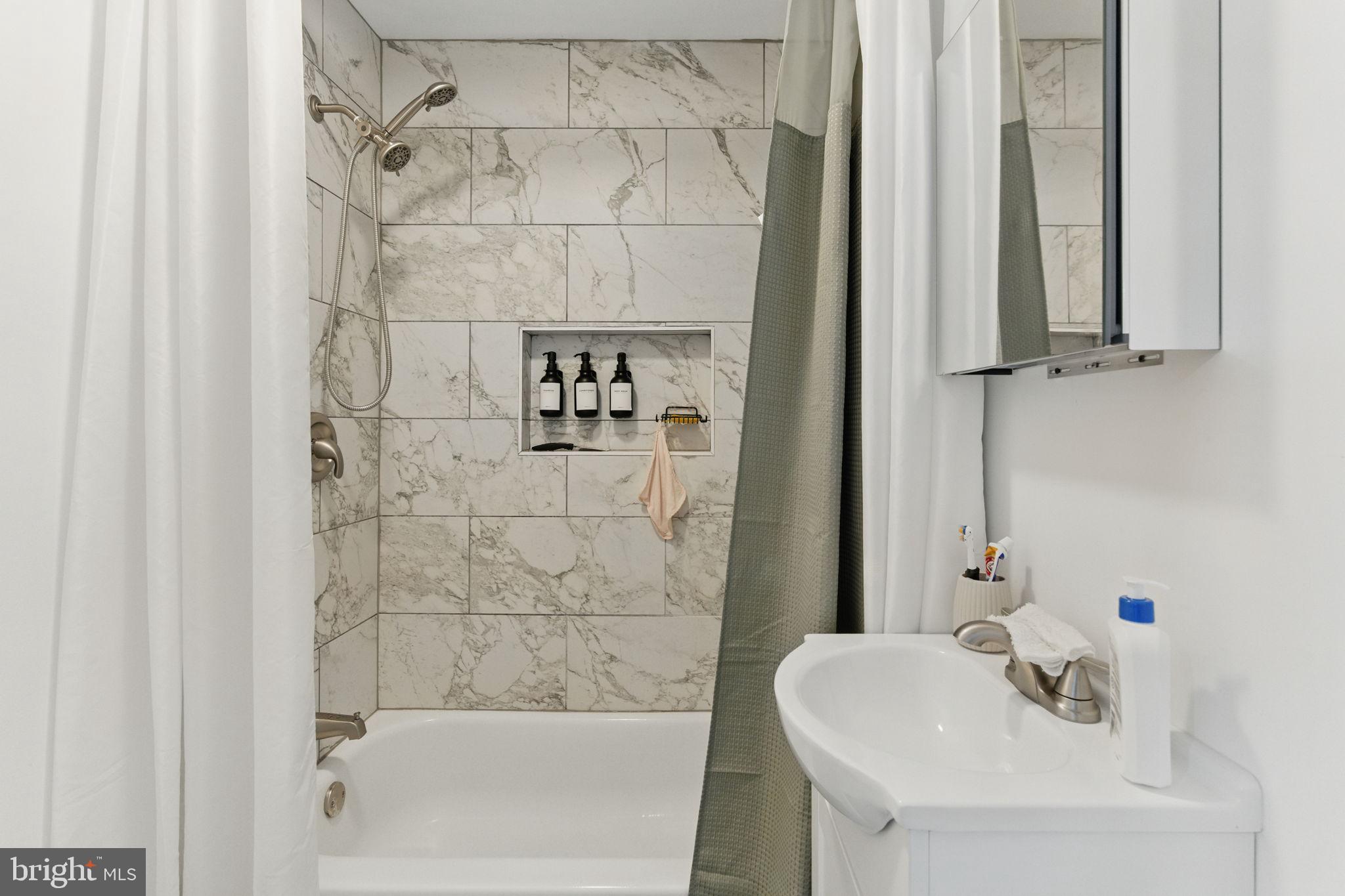 4508 Post Road Marcus Hook, PA 19061 - Photo 24 of 38 a bathroom with a sink and a shower