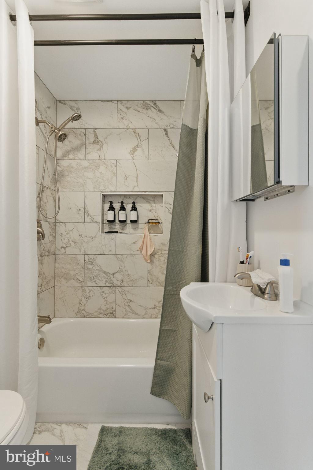 4508 Post Road Marcus Hook, PA 19061 - Photo 25 of 38 a bathroom with a sink toilet and shower