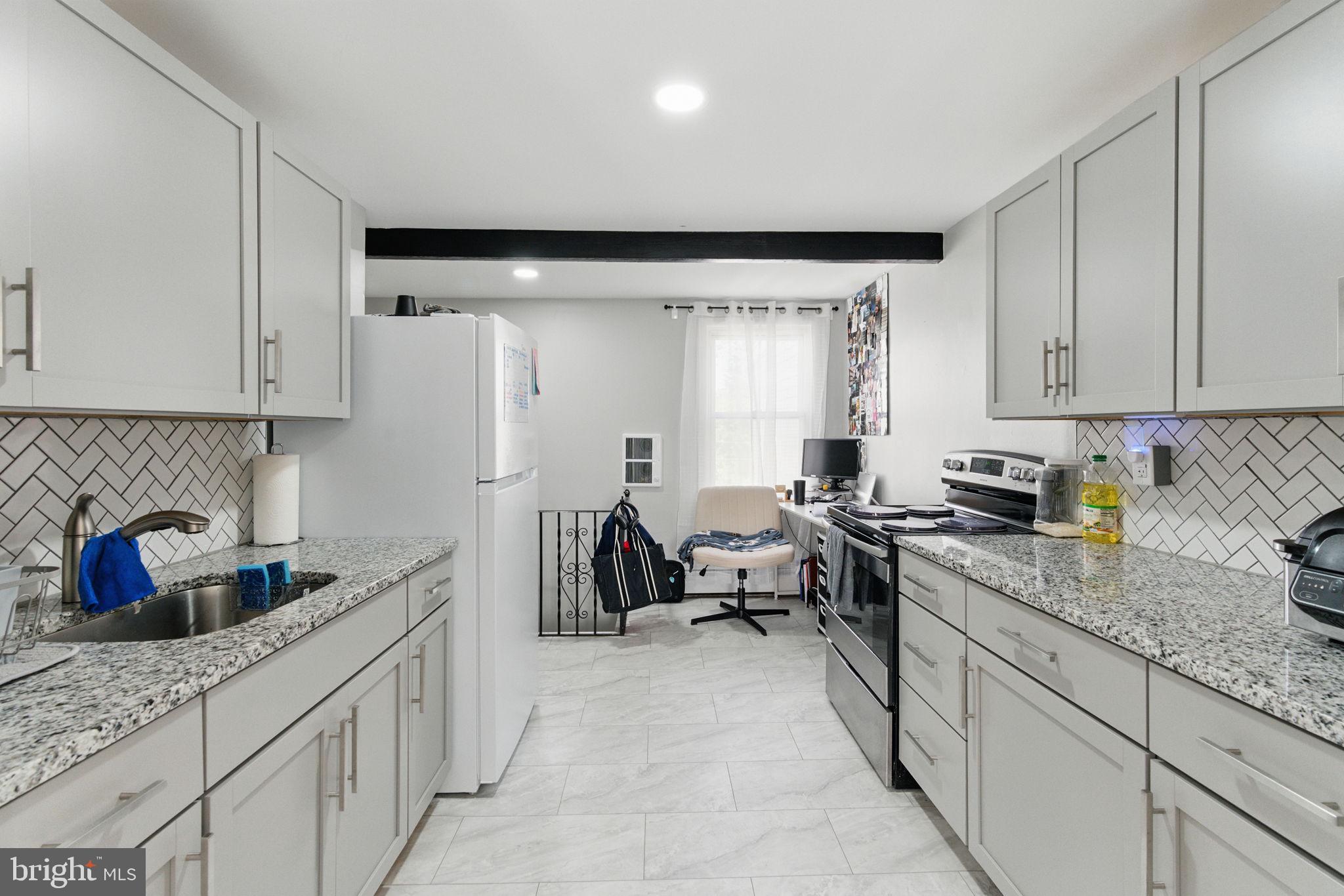 4508 Post Road Marcus Hook, PA 19061 - Photo 29 of 38 a kitchen that has a lot of cabinets in it and appliances