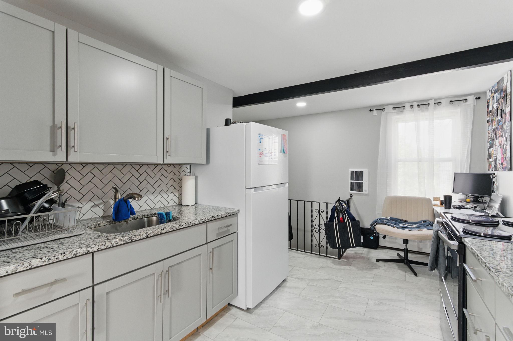 4508 Post Road Marcus Hook, PA 19061 - Photo 30 of 38 a kitchen with a refrigerator and a sink