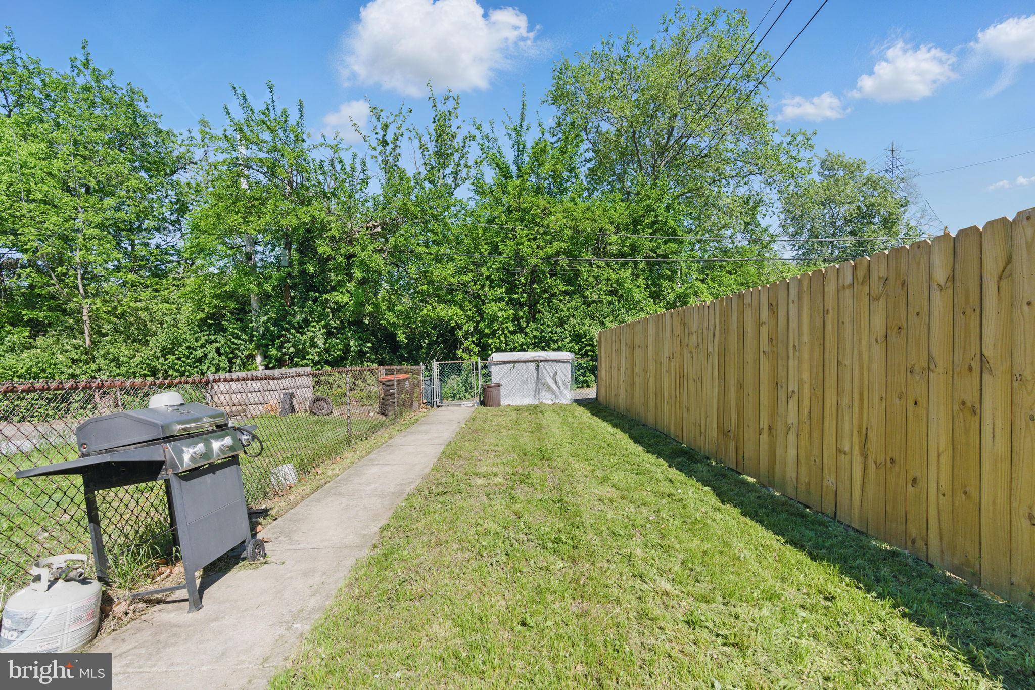 4508 Post Road Marcus Hook, PA 19061 - Photo 37 of 38 a view of a backyard with sitting area