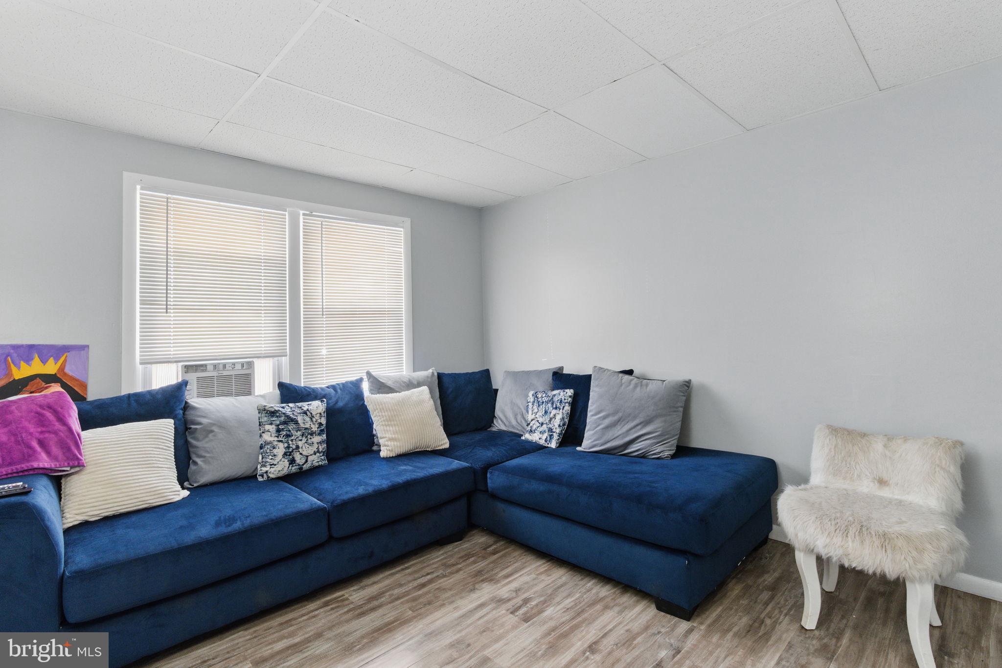 4508 Post Road Marcus Hook, PA 19061 - Photo 5 of 38 a living room with furniture and a large window