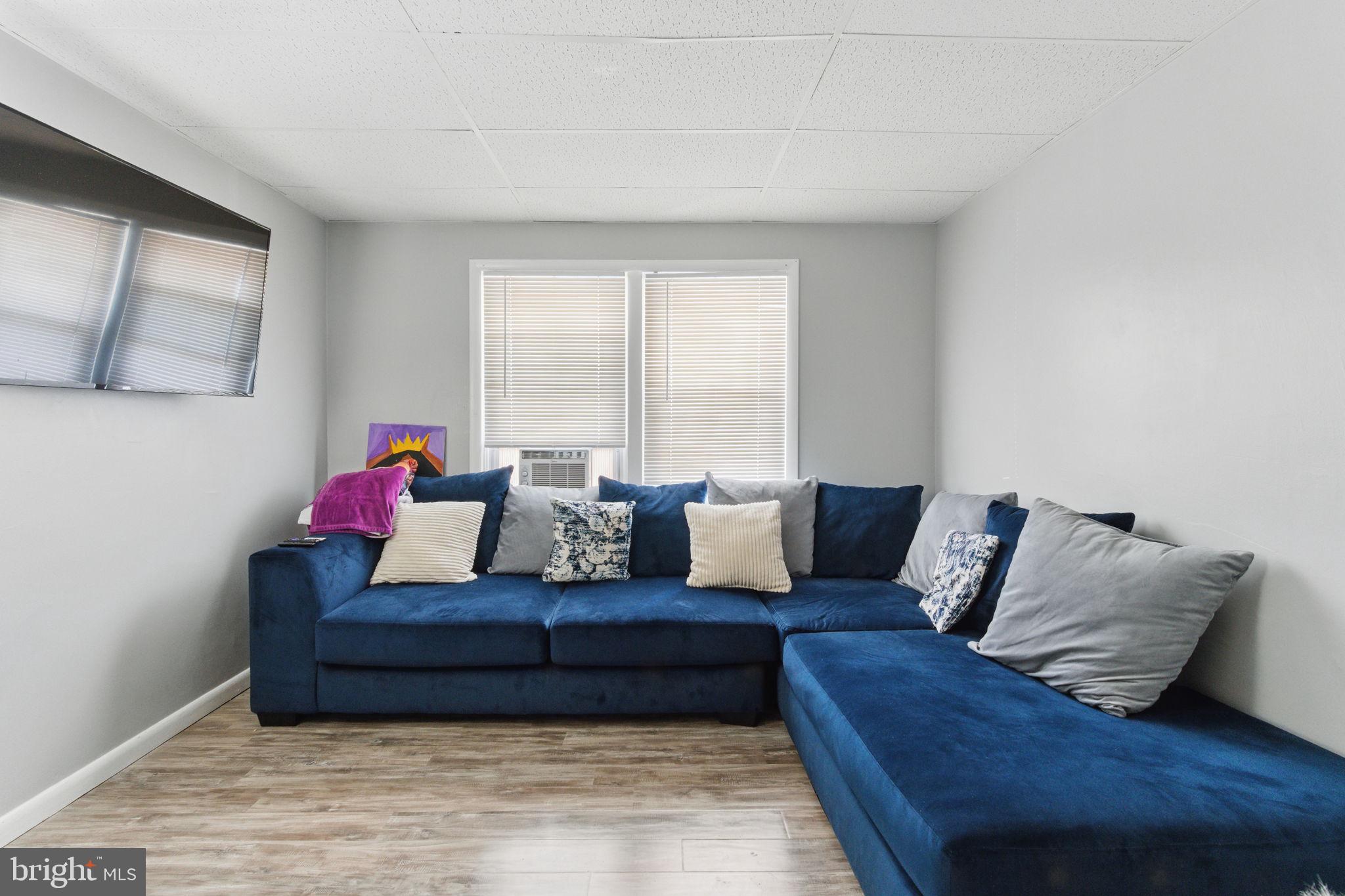 4508 Post Road Marcus Hook, PA 19061 - Photo 6 of 38 a living room with furniture and a wooden floor