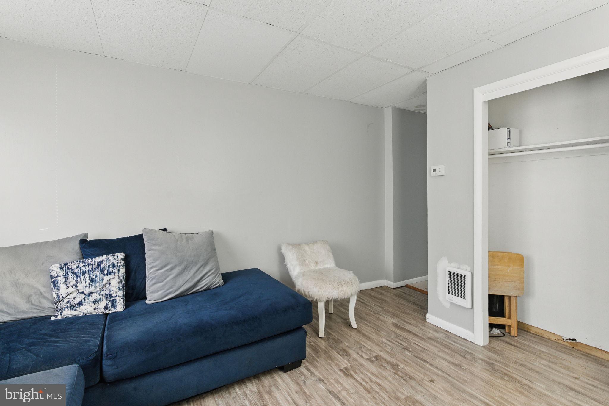 4508 Post Road Marcus Hook, PA 19061 - Photo 8 of 38 a living room with furniture and a wooden floor