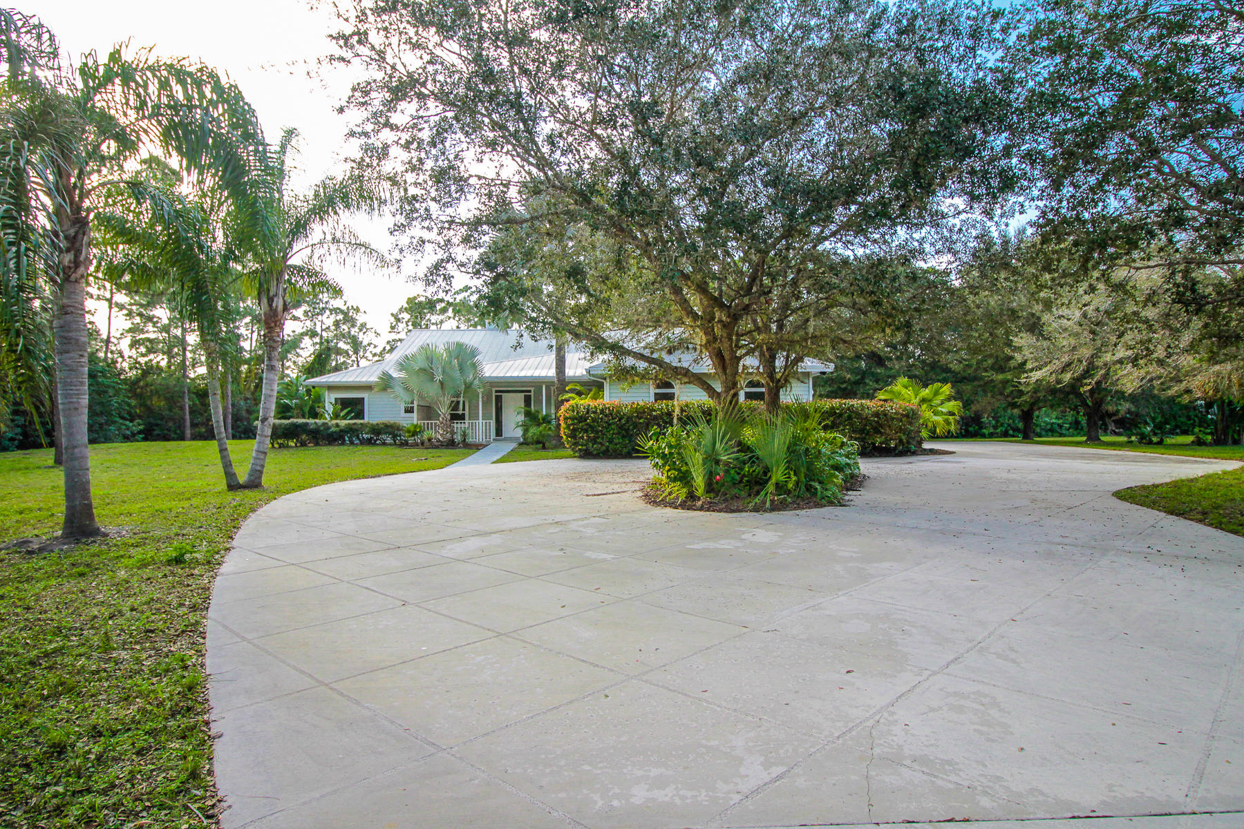 13580 Southeast Ranchland Road Hobe Sound, FL 33455 - Photo 2 of 52 Front