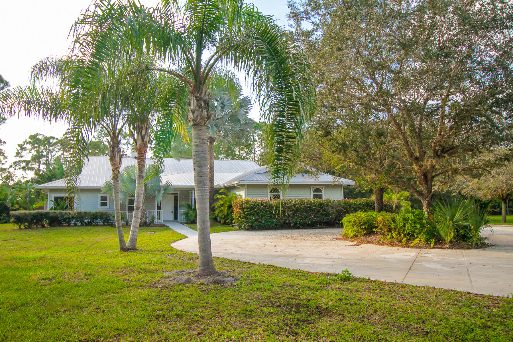 13580 Southeast Ranchland Road Hobe Sound, FL 33455 - Photo 3 of 52 Front