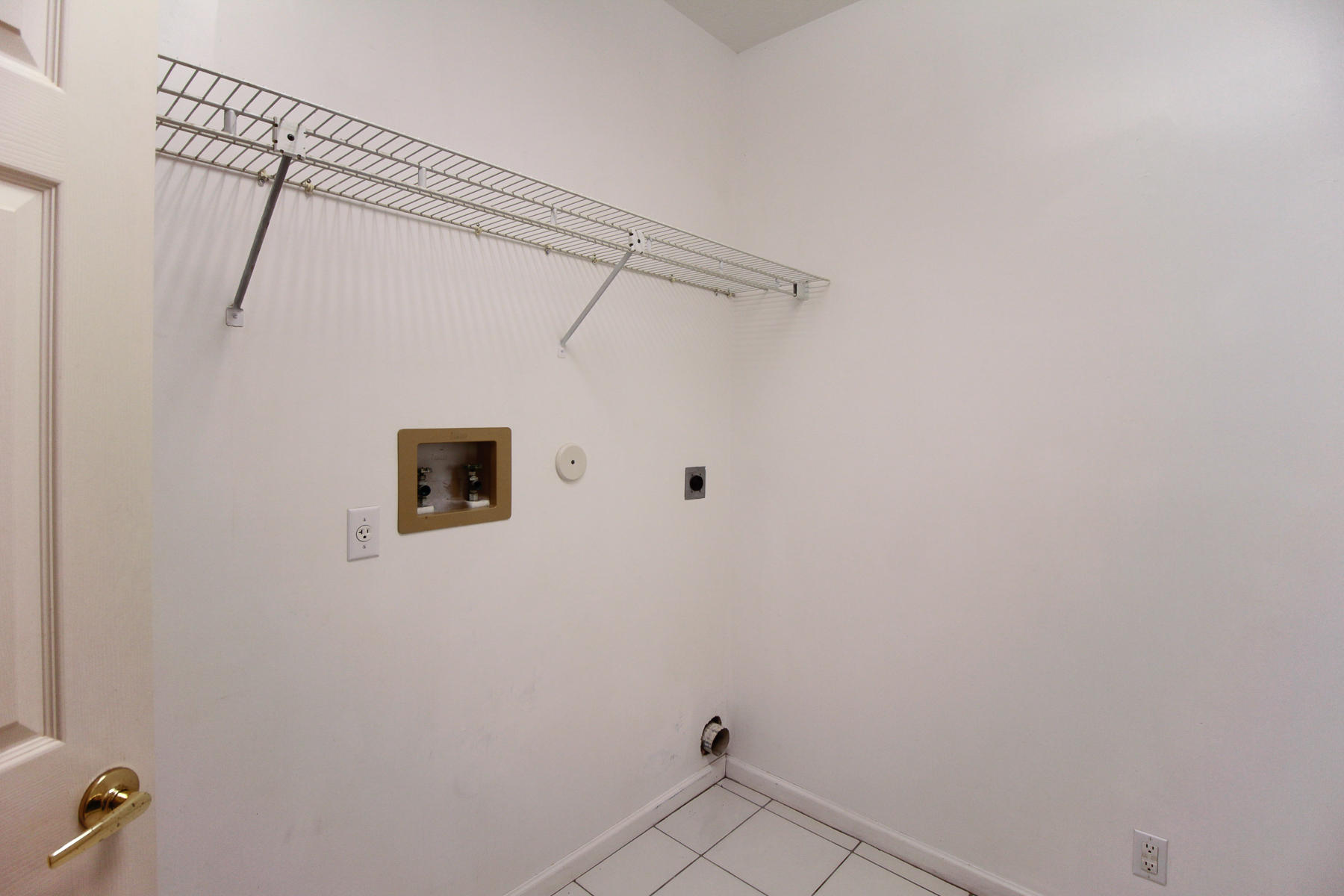 13580 Southeast Ranchland Road Hobe Sound, FL 33455 - Photo 42 of 52 LAUNDRY ROOM