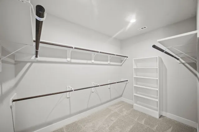 a view of an empty walk in closet