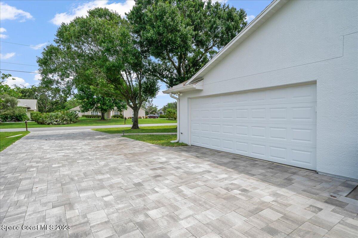 4548 Canard Road Melbourne, FL 32934 - Photo 34 of 44 a view of a backyard with large trees