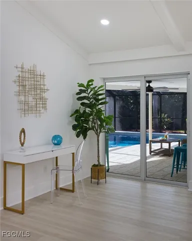 a view of hall with wooden floor