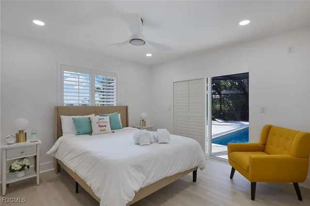 a bedroom with a bed and a couch