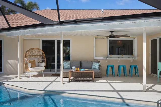 a front view of a house with a yard and a garage