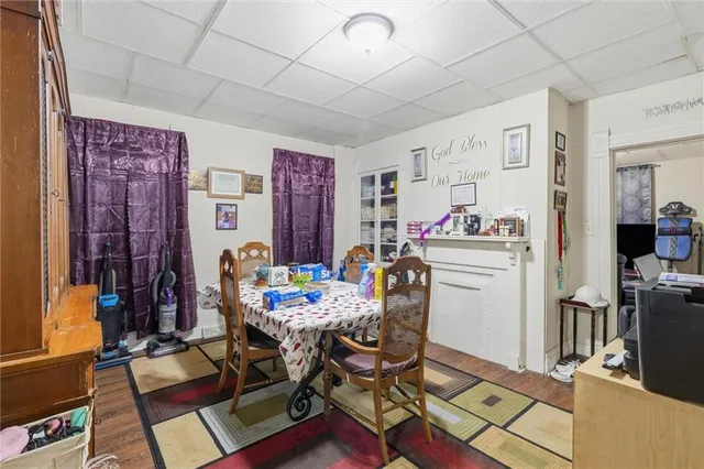 a bedroom that has a bed and a table in it