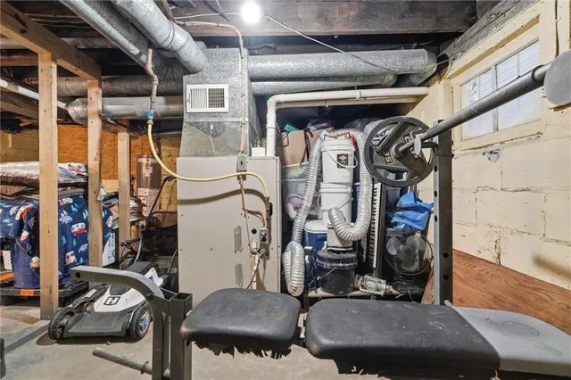 a view of a house with a backyard and sitting area