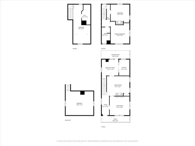 a view of a town with snow on the road