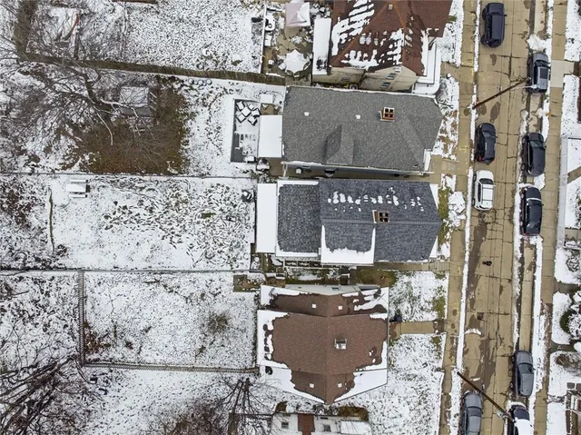 a view of a yard covered with snow