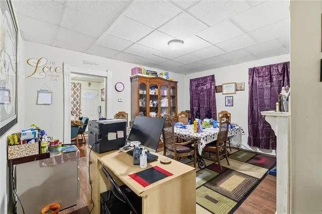 a view of a workspace with furniture and a livingroom