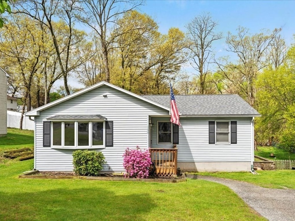 160 University Street Springfield, MA 01104 - Photo 2 of 30 a front view of house with yard and trees around