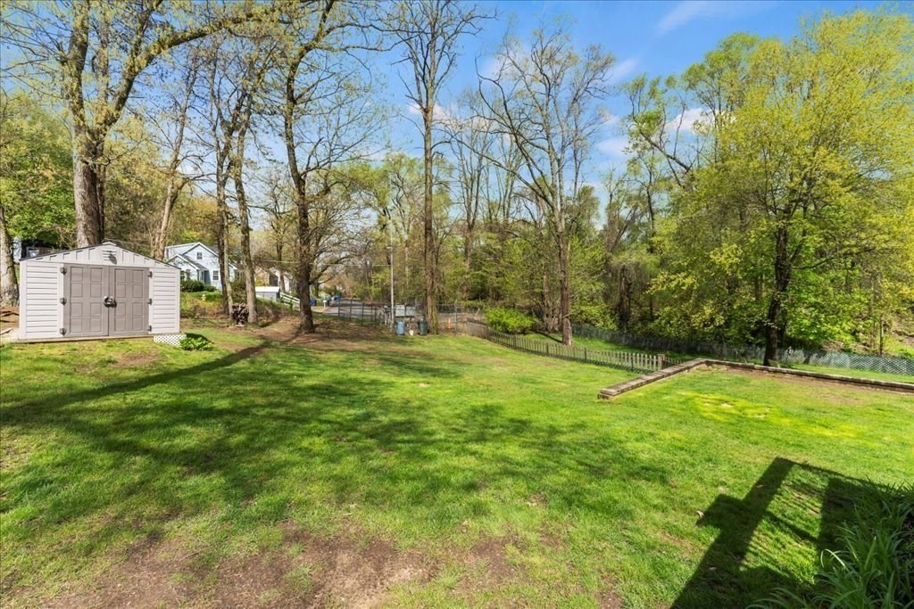 160 University Street Springfield, MA 01104 - Photo 26 of 30 a backyard of a house with lots of green space