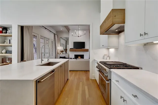 a kitchen with a stove and a sink