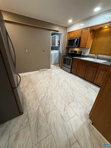 a bed room with a bed and furniture