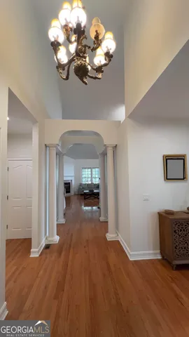 a view of a livingroom with wooden floor
