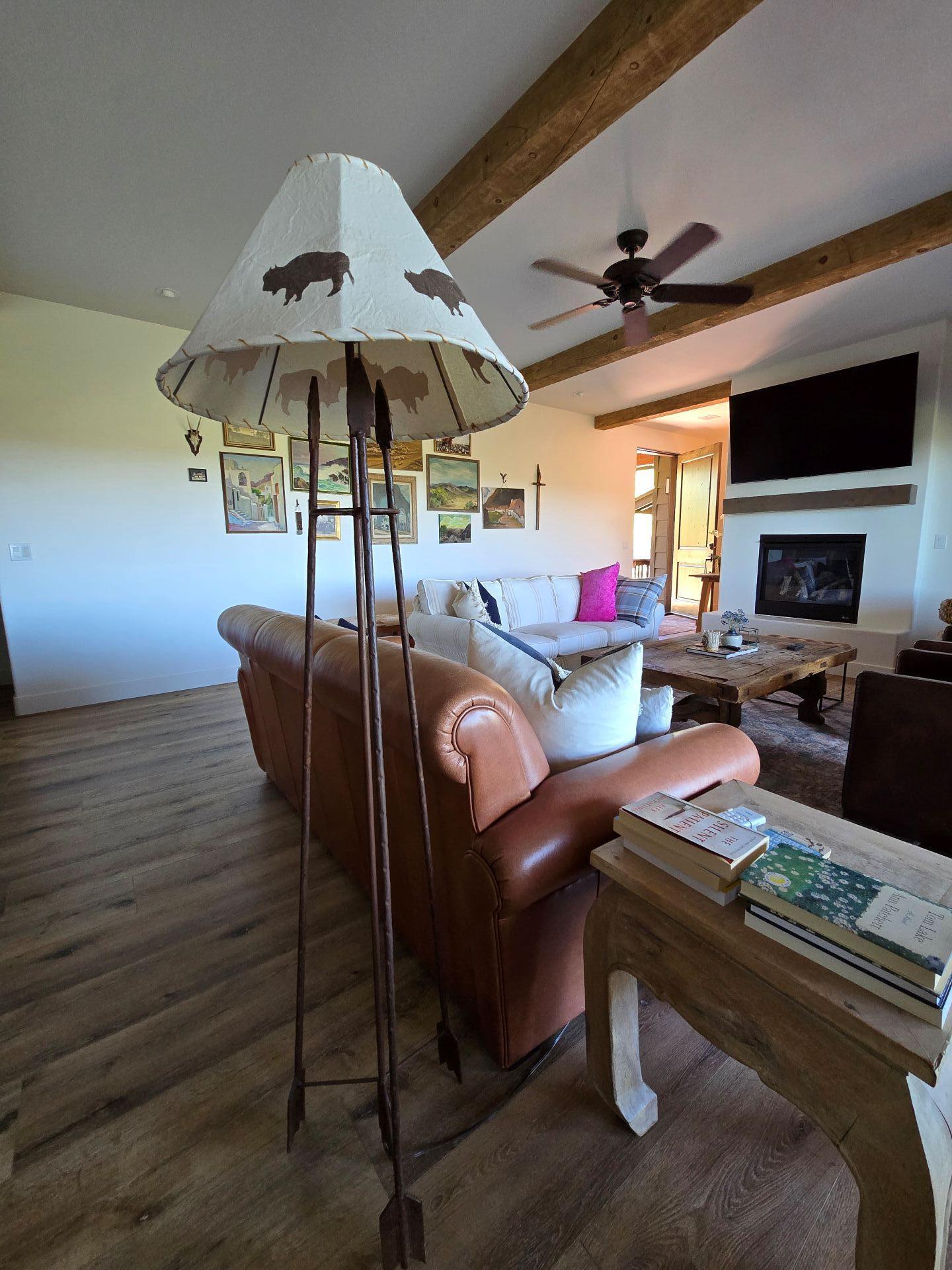 240 Rockinghorse Bend Road Payson, AZ 85541 - Photo 9 of 53 a living room with furniture a flat screen tv and kitchen view