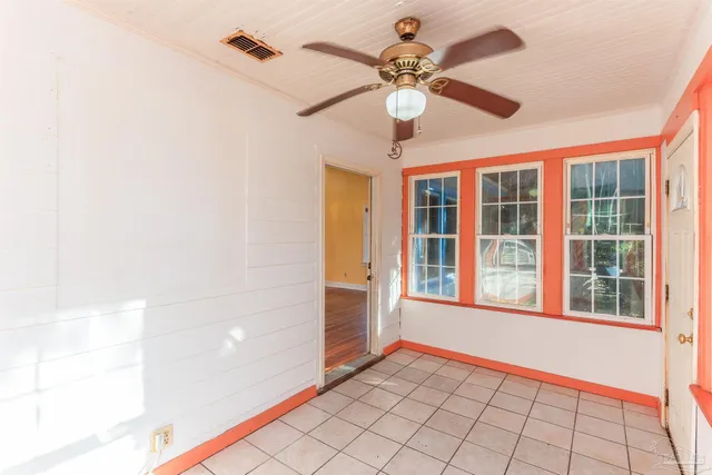 a view of a backyard with pathway