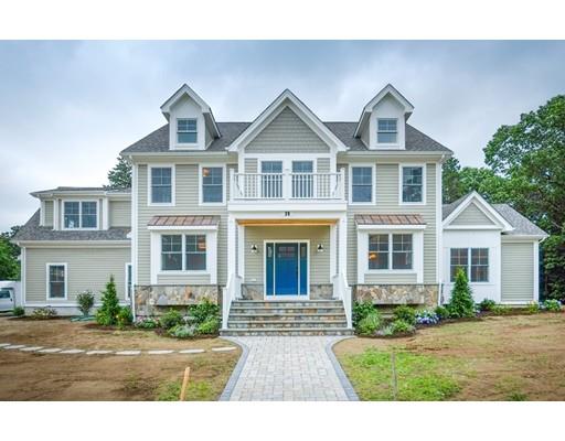 46 Michael Road Wayland, MA 01778 - Photo 1 of 9 a front view of a house with a yard