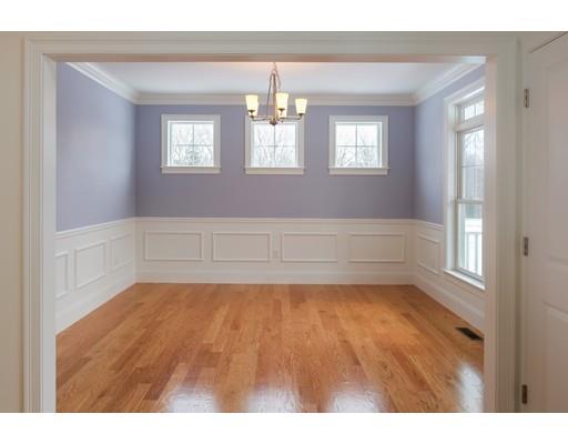 46 Michael Road Wayland, MA 01778 - Photo 5 of 9 a view of an empty room with wooden floor and a window
