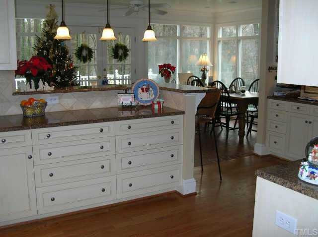 2818 Exeter Circle Raleigh, NC 27608 - Photo 6 of 10 Gathering room area with kitchen and sunroom opens onto deck and private yard. Other