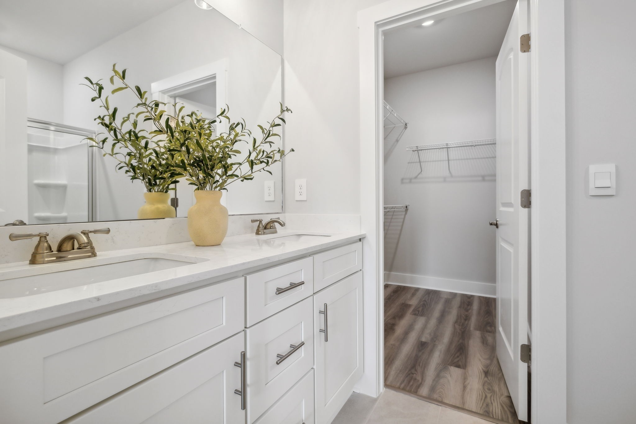 537 Tulip Springs Road Hermitage, TN 37076 - Photo 24 of 58 a bathroom with a sink a vanity and a mirror