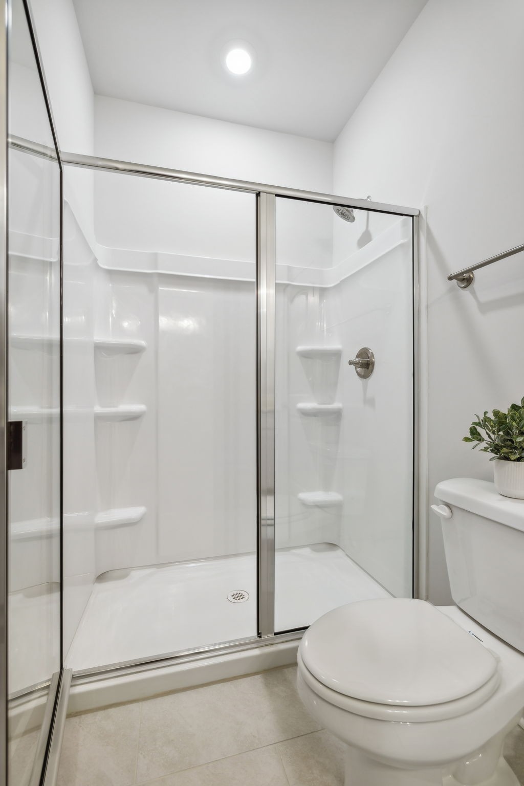 537 Tulip Springs Road Hermitage, TN 37076 - Photo 26 of 58 a bathroom with a toilet and a shower