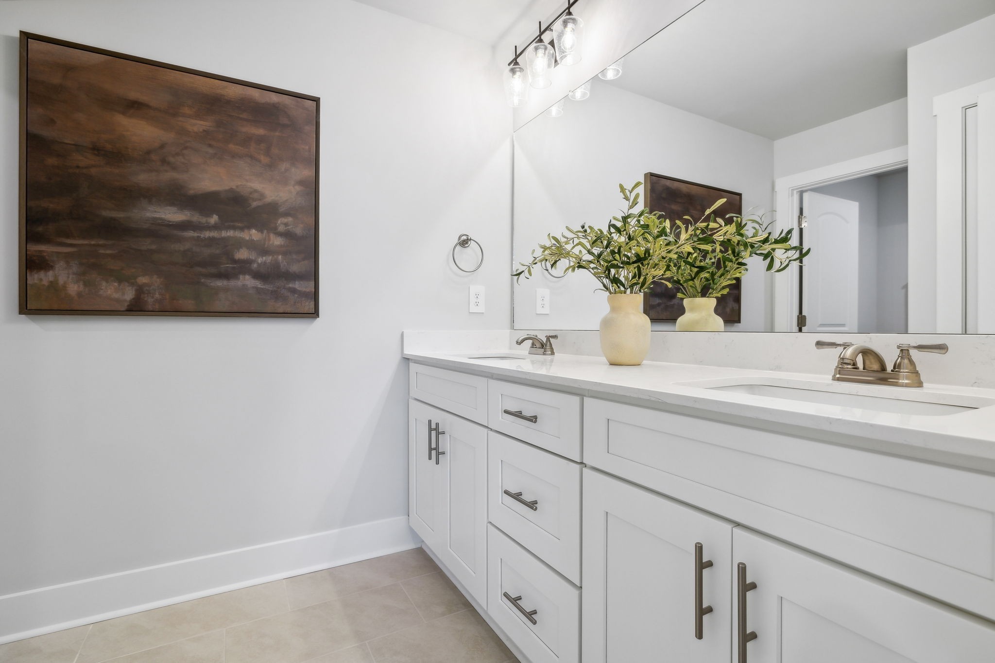 537 Tulip Springs Road Hermitage, TN 37076 - Photo 36 of 58 a bathroom with a sink and a mirror