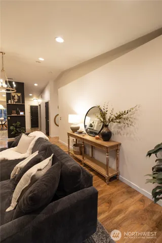 a view of kitchen with sink and wooden floor